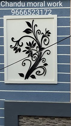 a sign on the side of a building that says chandu floral work 666 531 722