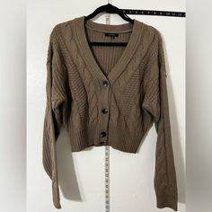 Boutique Quality/Style Chunky Over-Sized Button-Up Cardigan Sweater That Is Perfectly Matched With Boot-Cut, Flair, Skinny Or Distressed Style Pants Trendy Brown Button-up Cardigan, Trendy Brown Sweater With Button Closure, Oversized Cream Cardigan, Sleeveless Sweater Cardigan, Taupe Cardigan, Burgundy Cardigan, Long Black Cardigan, Long Open Cardigan, Long Knit Sweater