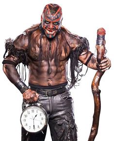 a man dressed as a demon holding a clock