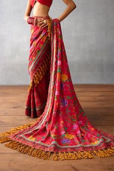 Red saree with all-over multi colored floral prints, clubs border and tasseled edged palla. - Aza Fashions Dhoti Saree, Cotton Sarees Handloom, Saree Women, Sanya Malhotra, Floral Print Sarees, Floral Saree, Saree For Women, Drape Saree, Red Saree