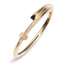 Description Handcrafted in 18 karat Yellow Gold, this Strong Heart bangle symbolizes love. Love is what makes our heart beat. From the same concept as our Strong Hearts Chain, each bangle is drawn from a heart, ending and beginning with love, yet the heart is still discrete. Complimented with pave diamonds and, this Strong Heart Bangle Story paired with a Pave Diamond Initial Heart Beat. Choose the letter or number that speaks to you the loudest.The opening of each Heart Beat has a heart silhoue Layered Bangles, Strong Heart, Heart Chain, Heart Gemstone, Heart Beat, More Love, Love More, Layered Bracelets, Gold Rush