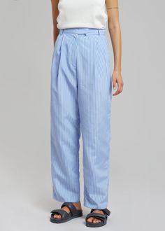 Color: White/Light Blue Midweight cotton fabric Relaxed straight leg silhouette Pleat front detail Pressed crease Slant hip pockets Hook and bar closure Belt loops 100% Cotton Dry Clean By The Frankie Shop. Imported Product Measurements: XS - 24" Waist, 36" Hip, 16" Rise, 28" Inseam S - 26" Waist, 38" Hip, 16.25" Rise, 28.5" Inseam M - 28" Waist, 40" Hip, 16.5" Rise, 29" Inseam L - 30" Waist, 42" Hip, 17" Rise, 29.25" Inseam XL - 32" Waist, 44" Hip, 17.5" Rise, 29.5" Inseam Model is 174cm/ 5'8" Stripe Suit, The Frankie Shop, Frankie Shop, Suit Pants, White Light, Parachute Pants, Color White, Straight Leg, Cotton Fabric