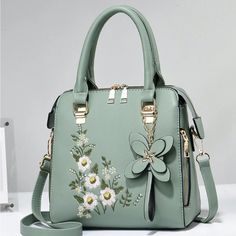 Brand New...Beautiful Floral Design Pattern, Lightweight Trendy Casual, Pu Leather, Top Zipper Closure, Square Bag, Perfect For Travel Or Daily Use, For All Seasons, Satchel Style, Gold Hardware. Hand And Crossbody Adjustable And Removable Strap, Exterior Back Zip Pocket, Interior Middle Divider Zip Pocket, 1 Slid Pocket And One Zip Pocket, Feet On Bottom, Smoke And Pet Free Home, Fast Shipping. Flower Handbag, Embroidered Handbag, Casual Crossbody Bag, Embroidered Tote Bag, Beg Tangan, Embroidered Tote, Floral Bags, Shoulder Messenger Bag, Flower Fashion