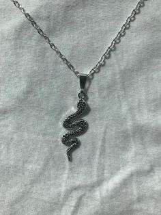 Snake silver pendent and chain.Available in 18", 20" and 24" chains.Please see the second picture for size reference. Rock Tattoo, Script Necklace, Emo Goth, Snake Pendant, Snake Earrings, Pendent Necklace, Cute Necklace, Rock Style, Star Necklace