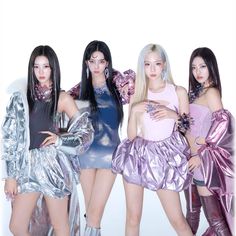 four girls in shiny outfits posing for the camera with their hands on their hipss