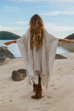 This Goddess Poncho is lighter and more simple than our heavy blanket high neck poncho, but looks fantastic, nevertheless! It is made of fluffy off white cotton with long gorgeous tassels.  The piece is open on the sides, so it fits everyone and you can just through it on top of any amount of layers true boho style! No buttons or pockets, essentially it is just an oriental blanket with a twist: it won’t slide from your shoulders.  Perfect to finish off the festival outfit in the evening – or just take it to the seaside café for extra coziness! Man Cardigan, Blanket Fringe, Bohemian Wrap