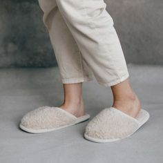 "High quality merino sheep wool slippers with non-slip sole, Slip on style, Cushion Comfort, Breathable, Handmade, for Women and Men, Beige, Indoor use. Crafted from pure 100% merino wool and finished in a nice natural colour, these hand made wool slippers are a true indulgence at an affordable price. The open-ended design is perfect for easy-on, easy-off use around the home. Wool is the perfect material for a slipper. This wonderful fibre regulates temperature and humidity to ensure you do not Cozy Beige Slip-on Slippers, Comfortable Soft Slippers For Home, Cozy Indoor Slippers With Rubber Sole, Soft Texture Indoor Slippers With Round Toe, Cozy Super Soft Slippers For Home, Cozy Super Soft Beige Slippers, Cozy Super Soft Home Slippers, Cozy Slip-on Slippers With Soft Texture, Cozy Round Toe Slippers For Relaxation