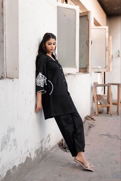 Summer Cotton Suits With Long Sleeves, Black Embroidered Cotton Sets, Elegant Black Cotton Lawn Suit, Formal Cotton Long Sleeve Set, Formal Long Sleeve Cotton Set, Fitted Cotton Lawn Suit For Work, Formal Black Cotton Kurta, Black Cotton Sets With Chikankari Embroidery, Black Summer Workwear Sets