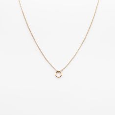 The Mini Circle Necklace is the perfect addition for your weekday wear or date night out! Materials: 14k Gold Fill, 14k Rose Gold Fill, Sterling Silver Measurements: 16" or 18"chain, 1/3" Pendant Minimalist Open Circle Necklace For Formal Occasions, Formal Minimalist Open Circle Necklace, Classic Rose Gold Charm Necklace For Everyday, Minimalist Rose Gold Charm Necklace With Cable Chain, 14k Rose Gold Chain Necklace With Round Pendant, Minimalist 14k Rose Gold Necklace, Everyday Rose Gold 14k Necklace, Minimalist 14k Gold Charm Necklaces For Formal Occasions, Simple 14k Rose Gold Charm Necklace