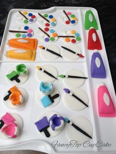 the tray is filled with different types of crafting supplies on it's surface