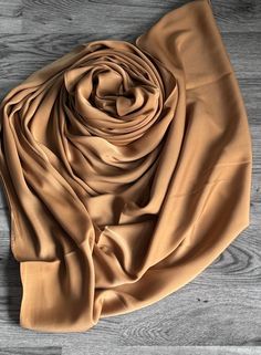 STUNNING LUXURY SOFT DEEP GOLD SCARF SATIN SLIK  Beautiful delicate soft lightweight fabric scarf This scarf is a perfect accessory for both daytime and evening wedding wear worn as a shawl & wrap  Made from 100% satin silk color-deep gold   gold    182cm length x 140cm width (approx)  Note: The colour of the scarf may appear slightly different in person as screen settings and lighting can affect how it looks on the phone or computer. Wear Shawl, Gold Scarf, Fabric Scarf, Evening Wedding, Shawl Wrap, Satin Silk, Wedding Wear, Gold Gold, Shawls And Wraps