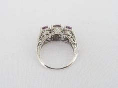 Vintage Sterling Silver Natural Amethyst Filigree Ring ...Marked 925...Total of weights 3.1grams...Size 8...Measure of Face 9.5MM...It's in very good condition. Amethyst Three Stone Ring, Classic Silver Amethyst Ring With Multi-stone, Formal Three Stone Amethyst Ring, Amethyst Three Stone Round Ring, Three Stone Amethyst Ring, Filigree Ring, Multi Stone Ring, Multi Stone, Vintage Sterling Silver