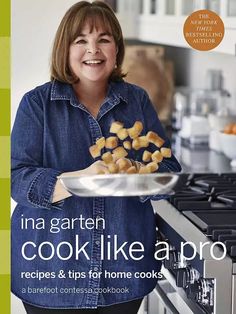 a cookbook with a woman holding a plate of food