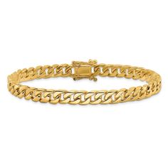 14K yellow gold with white gold tongue solid, flat beveled curb link bracelet with polished finish and box catch clasp. Measures approximately 8"L x 1/4"W. Classic Cuban Link Bracelet, Classic Cuban Link Bracelet With Polished Finish, Classic White Gold Cuban Link Bracelet With Curb Chain, Classic Cuban Link Chain Bracelet, Classic Formal Cuban Link Bracelet With Polished Finish, Classic White Gold Bracelet With Curb Chain, Classic 14k Gold Cuban Link Bracelet With Curb Chain, Classic 14k Gold Cuban Link Bracelet With Polished Finish, Bracelets Gold Diamond