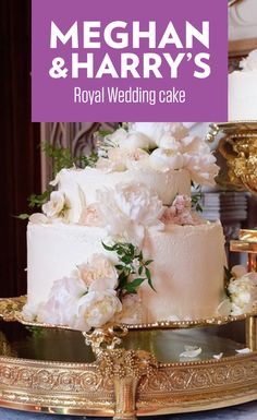 a wedding cake with white flowers on it and the words meghan & harry's royal wedding cake