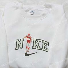 Introducing the Travis Kelce x Nike Embroidered Shirt, a must-have for NFL fans and fashion enthusiasts alike. This NFL Sport Embroidered T-shirt showcases the perfect blend of style and comfort. Made with premium quality materials, it offers a soft and breathable feel, ensuring all-day comfort. The embroidered design adds a touch of sophistication and showcases your love for the sport. This shirt is not only a great addition to your wardrobe but also makes for one of the best gift ideas for fam Nike Inspired, Gift Ideas For Family, Shirt Nike, Nfl Fans, Best Gift Ideas, Travis Kelce, Nfl Sports, Gameday Outfit, Adulting Shirts