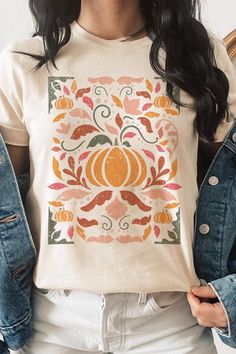 FLORAL PUMPKINS,THANKSGIVING,FALL UNISEX SHORT SLEEVE,GRAPHIC TEE,GRAPHIC TSHIRTS,TSHIRTS,TEES100%COTTON,HEATHER(52%COTTON,48%POLY),ATH.HEATHER,BLACK HEATHER(90%COTTON,574%POLY)NICARAGUAMade In: Nicaragua Pumpkin Silhouette, Pumpkin Graphic, Bulls Shirt, Floral Pumpkin, Pumpkin Thanksgiving, Boutique Style Outfits, Plus Size Boutique, Los Angeles Style, Jean Leggings