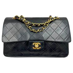 Chanel Vintage Classic Timeless Double Flap Lambskin 10″ Shoulder Bag *261xxxx * Made in France *Comes with the control number card and dustbag *24k Gold Plated Hardware -Approximately 10″ x 5.5″ x 2.5″ -Strap is approximately 16.5″ Single drop/ 9.5″ Double drop. -The current retail price is $10,200 + tax. -In a good vintage condition. The bottom part of the back has wrinkles. The color of the hardware is fainting off . Classic Leather Bag With Cc Turnlock Closure, Formal Bags With Double Flap And Leather Lining, Formal Double Flap Bags With Leather Lining, Designer Double Flap Bag With Leather Lining, Formal Soft Leather Bag With Double Flap, Evening Bags With Leather Lining And Double Flap, Evening Double Flap Bag With Leather Lining, Chanel 90s, Dream Bag