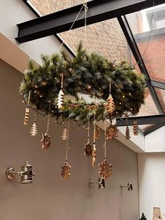 a christmas wreath hanging from the ceiling