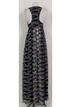 Fabulous maxi dress in a bold printed design. Made with a classic empire waist that creates a long flowy skirt. Style it with sandals and a wide brim sun hat for a weekend casual look. Size 2 100% silk V-neck Side zipper Maxi length Empire waist Lined Bust 28" Waist 27" Shoulder to hem 61.5" Long Flowy Skirt, Wide Brim Sun Hat, Skirt Style, Grey Prints, Flowy Skirt, Casual Sweaters, Printed Maxi, Sun Hat, Fashion Street