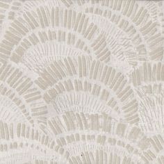 a white and beige wallpaper with an intricate design on it's surface,