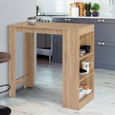 an open shelf in the middle of a kitchen