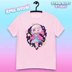 This Project Sekai Colorful Stage shirt features Emu Otori from Wonderlands x Showtime in a cute chibi style surrounded by stars~! ✨🌟 - 100% preshrunk cotton - Unisex T-Shirt - Classic fit - Fabric weight: 5.3 oz/yd² (180 g/m²) - Taped neck and shoulders for stability and stretch resistance - Tear away label Please allow additional processing time as this item is made-to-order~ ✨ Thank you! Note that if you purchase the shirt with stickers or keychains it will come in a separate package ! 📦 No Cute Short Sleeve T-shirt With Star Print, Pink Cute Shirt With Character Print, Cute Pink Shirt With Character Print, Kawaii Character Print Short Sleeve T-shirt, Pink Star Print Crew Neck T-shirt, Pink Crew Neck T-shirt With Star Print, Kawaii Crew Neck T-shirt With Cute Design, Kawaii Short Sleeve Shirt With Character Print, Kawaii Cartoon Print Crew Neck Shirt