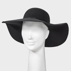 Keep your face shaded in elegant style with this Wide Floppy Hat from A New Day™. Made from midweight felt fabric, this hat features a wide, floppy brim and 4.5-inch crown height. The solid color makes it easy to pair with a variety of outfits, and the adjustable design helps you find a perfect fit. A New Day™: Style that goes wherever you do. Adjustable Wide Brim Felt Hat For Evening, Chic Wide Brim Felt Hat For Kentucky Derby, Wide Brim Felt Cloche Hat, Chic Curved Brim Sun Hat, Elegant Felt Bucket Hat, Chic Black Wide Brim Felt Hat, Elegant Wide Brim Solid Color Sun Hat, Elegant Brimmed Sun Hat For Fall, Elegant Solid Brimmed Sun Hat