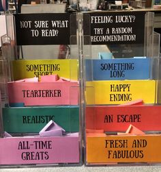 there are many different colored boxes with writing on them that say something happy ending and not sure what to read