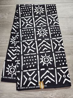 White and Black Tribal Ankara Fabric. This is fabric is sold by the fold and each fold is approximately a yard.  This fabric is 100% cotton and has a width of 44in.  It can be used make different clothing, quilting and other sewing projects. Purchases of more than a yard, it will come in a continuous piece We ship via USPS First Class Mail, USPS Priority mail or UPS Traditional Black Fabric With Block Print, Traditional Black Block Print Fabric, African Traditional Wear, African Ankara, African Wax Print, The Fold, Ankara Fabric, Family Picture, Wax Print