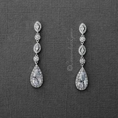 Dazzle your ears with these elongated pear or teardrop CZ dangle earrings. These earrings are a fabulous choice for weddings, proms, homecomings or any special occasion in need of some extra sparkle! Pierced post backs and 2 1/8 inches long. Rhodium plated, gold plated or rose gold plated, grade AAA cubic zirconia and lead free. Go here for the matching pendant! Diamond Teardrop Earrings, Dangling Diamond Earrings, Christian Jewellery, Wedding Earrings Vintage, Diamond Earrings Design, Wedding Day Jewelry, Jewel Wedding, Prom Earrings, Bride Earrings