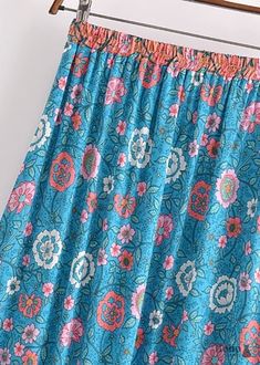 Boho Skirts in Verbena Flower in Blue For Women Fabric: Cotton Rayon Blend Garment Care: To keep your clothes in good condition, please hand wash or wash them in the washing machine with a delicate cycle in cold water. Using a laundry mesh bag can prevent tangling and tearing. Size: Our size differs from AU, EU, and US sizes. Please compare the detail sizes with yours before ordering. Please allow 1-2 cm differences due to manual measurement. Size runs small. We recommend ordering a size up to a Blue Summer Skirt With Elastic Waistband, Blue Printed Beach Skirt, Summer Blue Floral Print Skirt, Light Blue Bohemian Bottoms For Spring, Bohemian Light Blue Bottoms For Spring, Bohemian Light Blue Bottoms For Vacation, Bohemian Light Blue Spring Bottoms, Blue Floral Print Summer Skirt, Blue Floral Print Skirt For Summer