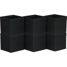 four black storage bins sitting side by side