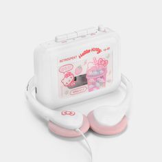 the hello kitty headphones are white and have pink earbuds attached to them