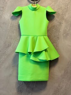 Gorgeous kelly green  interview dress with  cap sleeves and ruffles. Zipper back.   Color: lime green, kelly green. Can  be made special for your little girl in any size and color. Recommendations for care: hand washing in cold, warm water, soft iron. Kelly Green Sleeveless Party Dress, Kelly Green Fitted Party Dress, Light Green Fitted Dress With Short Sleeves, Green Peplum Party Dress, Fitted Green Ruffled Dress, Fitted Green Dress With Ruffles, Fitted Green Dresses With Ruffles, Green Fitted Dress With Ruffles, Fitted Light Green Dress With Ruffles