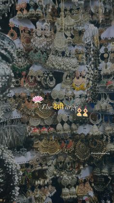 an image of many different earrings on display