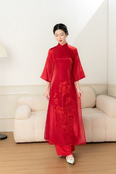 🌿 This set includes traditional Ao Dai, red pants. Style: Traditional Material: Very well made with high-quality double layers silk Collar: traditional collar Please provide bust-waist-and hip measurements when placing your order to ensure the best fit for you. 🌿 NOTE: * Recommend gentle washing * Please contact us for any inquiries about size. We don't have an exchange policy for the wrong size * It is safe for a washer and dryer in a "delicate" setting. * Actual Ao Dai colors may differ up t Traditional Red Embroidered Cheongsam, Red Cheongsam For Spring Festivals, Red Cheongsam For Spring Festive Occasion, Festive Red Cheongsam For Spring, Traditional Long Sleeve Red Cheongsam, Festive Traditional Cheongsam With Short Sleeves, Festive Traditional Short Sleeve Cheongsam, Red Fitted Ao Dai For Festivals, Traditional Red Sets For Spring