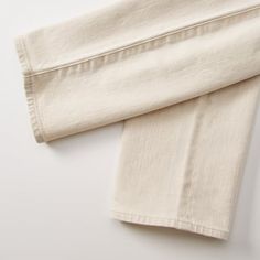 A remarkable pair of Japanese-born and Los Angeles-made selvedge denim jeans with 4-way stretch Beige Jeans With Five Pockets And Straight Hem, Beige Straight Hem Jeans With Five Pockets, Beige Straight Hem Cotton Jeans, Beige Cotton Jeans With Straight Hem, Cream Straight Leg Denim Jeans, Classic Cream Jeans For Workwear, Classic Beige Jeans For Everyday, Classic Beige Jeans For Everyday Wear, Classic Cream Jeans With Five Pockets