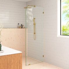 a bathroom with a sink, shower and window