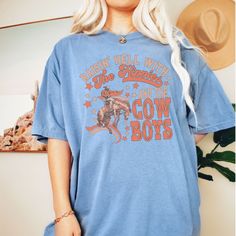 "Super cute vintage-inspired Raisin hell with the hippie's and rodeos tee design on the premium, luxurious Comfort Colors® 1717 t-shirt you will not want to take off. Sure to bring cheerful vibes to you and your friends. ✅ Super Comfy 100% Ring-Spun Cotton T-Shirt That Feels \"Broken in\" And Soft For Your Skin ✅ Garment Is Made With The Most Expensive Dyeing Process, Reducing Shrinking Up To 99% ✅ Relaxed, Unisex Fit Will Be Great For Women And Men (To Get That T-Shirt Dress Effect, Size Up 2 S Vintage Summer T-shirt For Rodeo, Crew Neck T-shirt For Western-themed Spring Events, Graphic Tee For Western-themed Spring Events, Spring Graphic Tee For Western-themed Events, Retro T-shirt For Western-themed Summer Events, Pre-shrunk T-shirt For Western-themed Summer Events, Retro Summer T-shirt For Western-themed Events, Casual Cotton T-shirt For Western-themed Events, Trendy Short Sleeve T-shirt