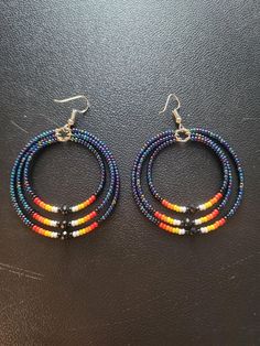 Beaded Hoop Earrings.  #10 Czech beads.  2" in diameter. Adjustable Hoop Beaded Earrings With Dangling Beads, Adjustable Hoop Earrings With Dangling Beads, Adjustable Small Hoop Earrings With Dangling Beads, Adjustable Hoop Beaded Earrings With Colorful Beads, Adjustable Colorful Beaded Circle Hoop Earrings, Adjustable Large Beaded Hoop Earrings As Gift, Adjustable Beaded Dangle Hoop Earrings, Adjustable Hoop Earrings With Black Beads, Adjustable Beaded Hoop Earrings