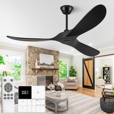 a living room with a ceiling fan and remote control