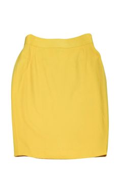 This Escada skirt is a closet staple. Perfect for the day, it has a bold yellow color that will complement any silk top or blazer. Size US 8 - DE 38 100% new wool Made in Germany Concealed back zipper closure Lined interior Slit on back Waist 28" Hips 34" Total length 25" Yellow Skirt, Wool Pencil Skirt, Casual Jackets, Closet Staples, Street Casual, Fashion Street, Silk Top, Casual Jacket, 8 M