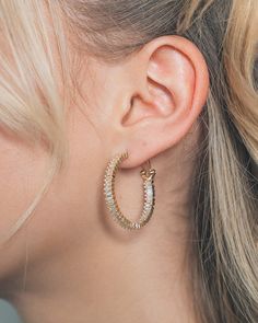 Look good, feel great with Mischa Statement Hoops! Whether you're at the office, on a night out with friends, or walking the red carpet, these babies will make sure you are looking your best. Materials: 14K gold or rhodium plated brass, cubic zirconia Features: 1.2" hoop, 0.15" width, 3mm stones, Lead & Nickel free, hinged post back Trendy Yellow Gold Hoop Earrings For Parties, Gold Huggie Jewelry For Parties, Gold Hoop Huggie Earrings For Party, Gold Huggie Earrings For Party, Glamorous Yellow Gold Hoop Earrings For Party, Hypoallergenic Hoop Jewelry For Party, Glamorous Small Hoop Earrings As Gift, Party-ready Tarnish-resistant Round Hoop Earrings, Small Hoop Gold Plated Earrings For Party