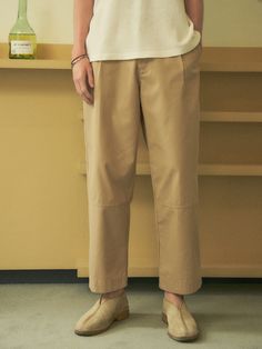 Editor's NoteHALBKREIS LAYOUT's wide pants is made out of soft and wrinkle resistant cotton blend fabric that is processed for minimum distortion. With a wide but straight fit, it is casual but still has a refined mood. It has a design point of seam line on the knee. Style it with various items during spring and summer for comfortable look. - Seamline on the front knee- Wide straight silhouette- Pin tuck on the front- Back patch pocketsMeasurements (in.)S/M/L- Length: 37.40 in. / 37.80 in. / 38.19 in.- Waist: 15.55 in. / 16.34 in. / 17.13 in.- Thigh: 14.96 in. / 15.35 in. / 15.75 in.- Rise: 12.60 in. / 12.99 in. / 13.39 in.- Hem: 8.86 in. / 9.06 in. / 9.25 in.Model info: Height - 6'1, Weight: 150 lbs, Wearing size MComposition & Care- Cotton 67% Polyester 33%- Dry clean recom Cream Cotton Wide Leg Ankle-length Pants, Relaxed Fit Khaki Pants For Business Casual, Relaxed Fit Wide-leg Chinos For Business Casual, Business Casual Wide-leg Chinos With Relaxed Fit, Business Casual Wide-leg Relaxed Fit Chinos, Business Casual Relaxed Fit Wide-leg Chinos, Solid Wide-leg Cotton Chinos, Solid Cotton Wide-leg Chinos, Beige Cotton Wide Leg Pants For Work