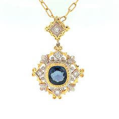 This pendant features a gem-quality blue sapphire and is a stunning example of timeless elegance! The custom-made design was envisioned specifically for this sapphire and displays the extraordinary craftsmanship that is a hallmark of our jewelry. Handmade in 18k white and yellow gold and accented with diamonds, the intricate detail, fine craftsmanship and skilled finishing details on this piece are remarkable! A timeless piece you will enjoy and cherish forever! 18k yellow gold chain included. 1 Luxury Blue Necklace With Single Cut Diamonds, Luxury Blue Necklaces With Single Cut Diamonds, Exquisite Blue Jewelry With Single Cut Diamonds, Blue Rose Cut Diamond Pendant Jewelry, Blue Rose Cut Diamond Pendant Necklace, Formal Blue Necklace With Rose Cut Diamonds, Blue Pendant Necklaces With Rose Cut Diamonds, Luxury Sapphire Oval Pendant Necklace, Sapphire Pendant With Single Cut Diamonds