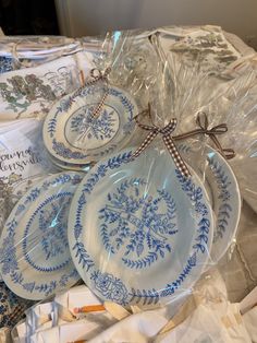 blue and white plates are on the table