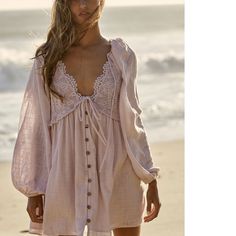 New Without Tags Color: Bubble Bath Forever Femme And So Stunning, This Must-Have Mini From Our Endless Summer Collection Features A Plunging Neckline With Lace Piecing And Puffed Sleeves In A Breezy, Woven Fabrication. Button-Up Silhouette Tie Closure At Front Banded Sleeves Endless Summer Whether You Live The Beach Lifestyle Year-Round Or Dream Of Making The Great Escape, The Endless Summer Collection Is Full Of Our Most Effortlessly Ethereal Styles Under The Sun. Care/Import Machine Wash Cold Purple Lace Dress For Beach, Purple Lace Beach Dress, Summer Work Dresses, Look Boho Chic, Cute Mini Dress, Free People Summer, Free People Style, Free People Clothing, Family Photo Outfits