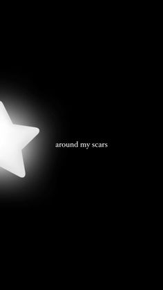 a white star with the words around my scars on it