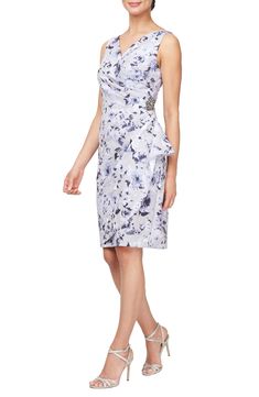 Soft pleats shape this floral print sheath designed in a sleeveless silhouette and adorned with a lustrous side embellishment. 39" length (size 8) Hidden back-zip closure V-neck Sleeveless Lined 100% polyester Hand wash or dry clean, dry flat Imported Elegant Sleeveless Dress With Asymmetrical Neckline For Spring, Chic Formal Sleeveless Dress With Floral Print, Dressy Sleeveless Floral Print Dresses, Elegant Sleeveless Floral Print Party Dress, Elegant Floral Print Sleeveless Party Dress, Fitted Sleeveless Floral Dress For Evening, Evening Sleeveless Floral Print Dress, Formal Fitted Sleeveless Dress With Floral Print, Formal Sleeveless Floral Print Dresses